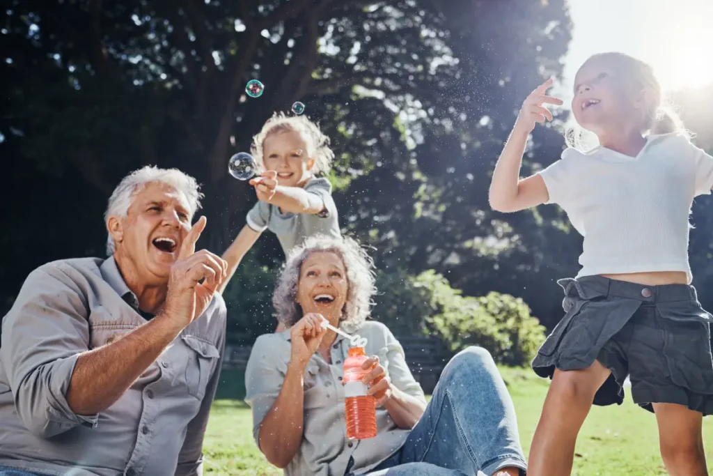 Seniors and grandkids playing outside